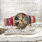 Amore Vintage Dameshorloge met Regenboog Patroon en Gevlochten Band Regenboog
