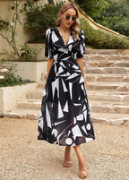Evelyn | Dames Midi-Jurk - Bloemenprint, Flatterend Ontwerp Zwart